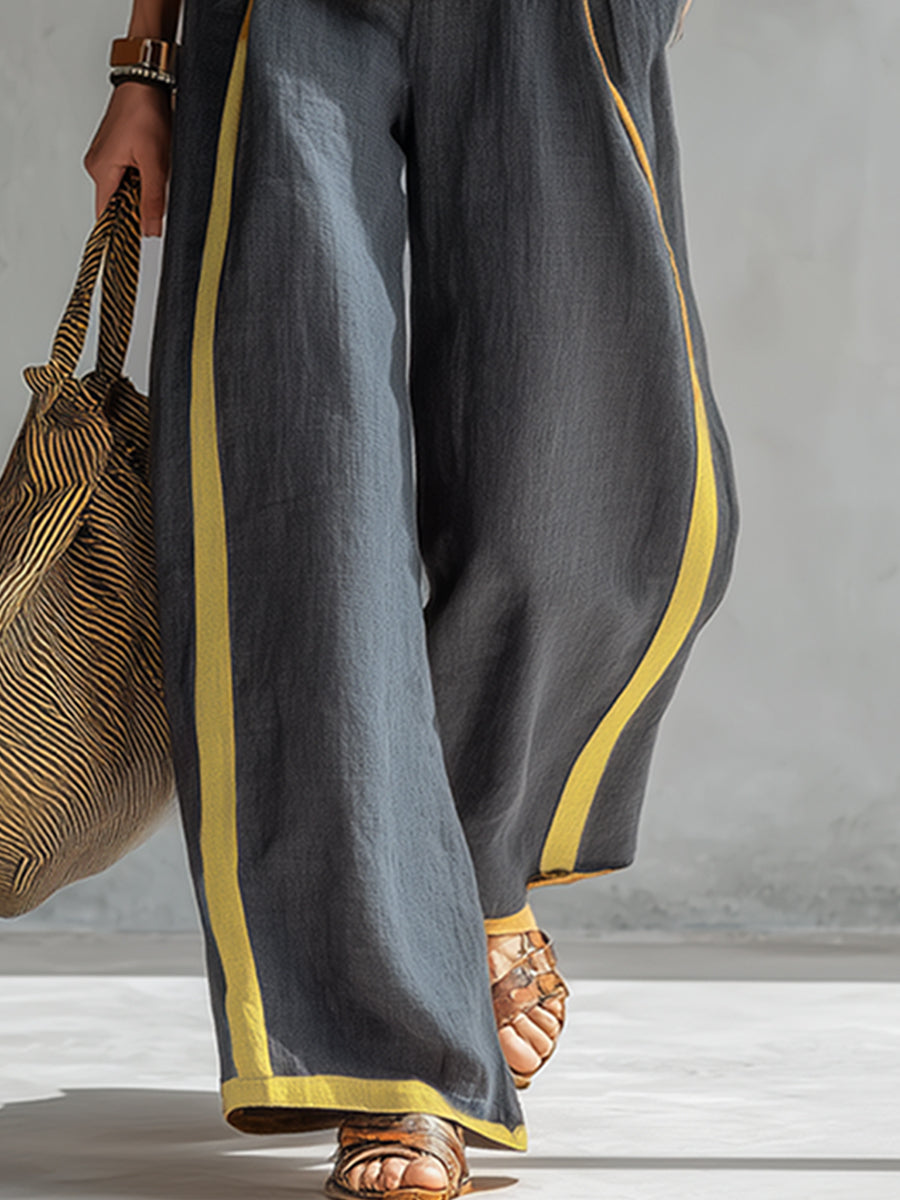 Women's gray elegant vest and pants set. A comfortable two-piece matching outfit for workwear or stylish everyday look.