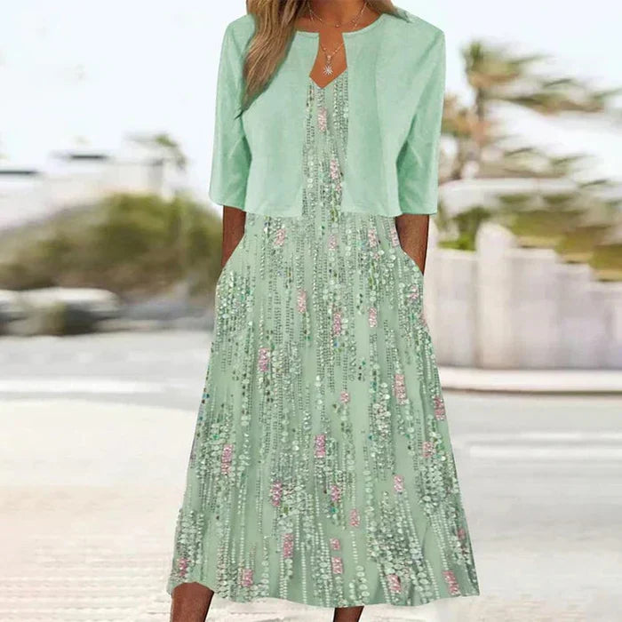 Elegant women's green floral sequin midi dress & matching jacket set. Perfect two-piece formal outfit for wedding guests & special occasions.