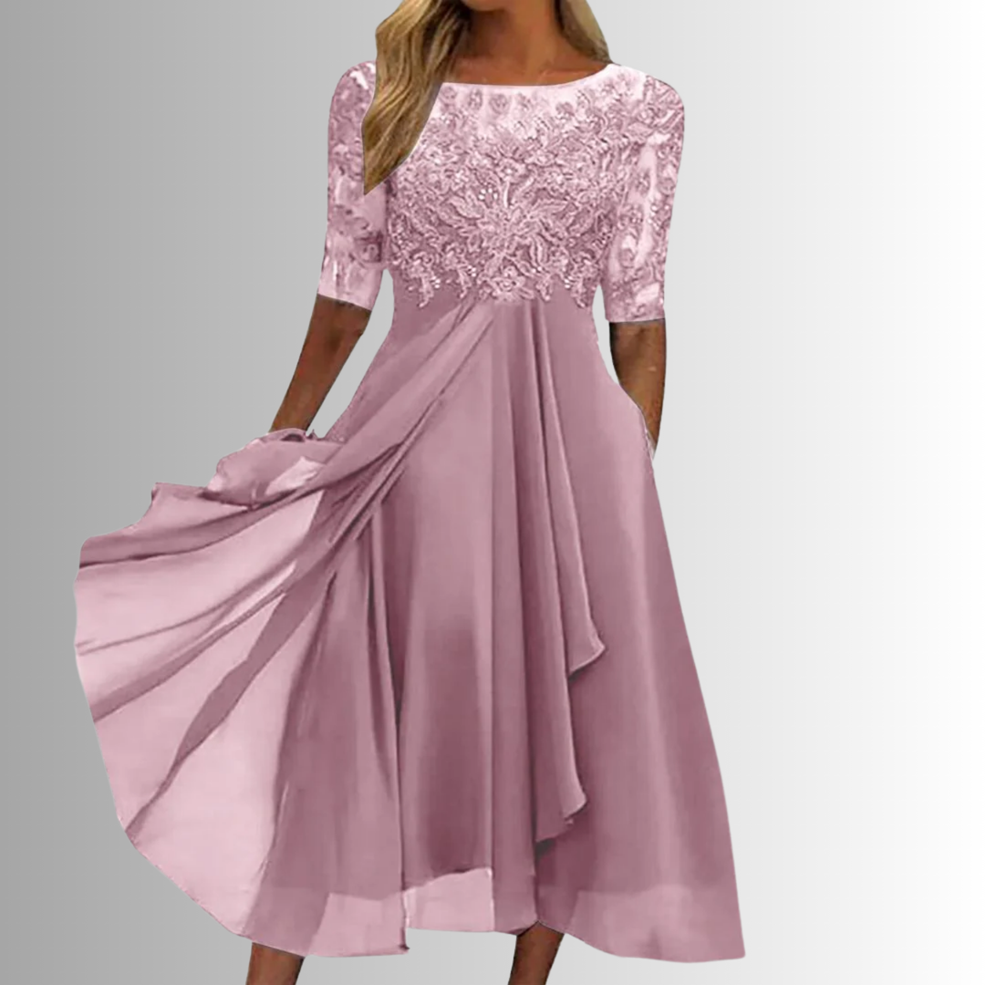 Flattering A-line half sleeve midi dress for women, featuring an elegant layered skirt and round neck. Party wear.