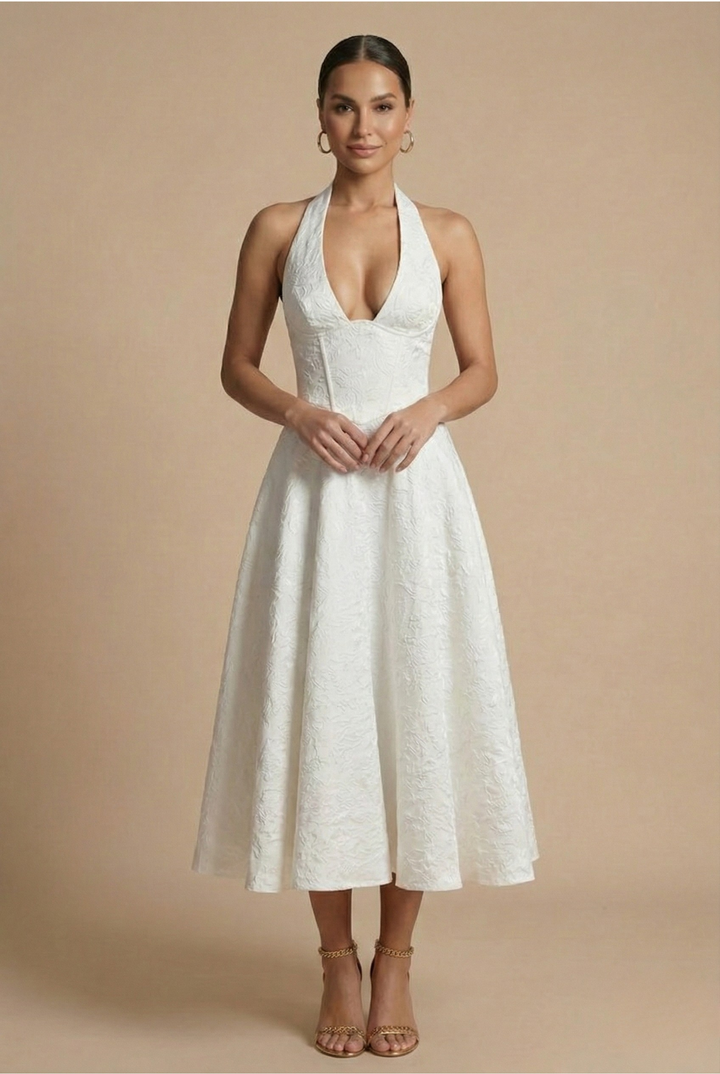 Full-length view of a women's formal halter corset A-line midi dress, showcasing its chic design.