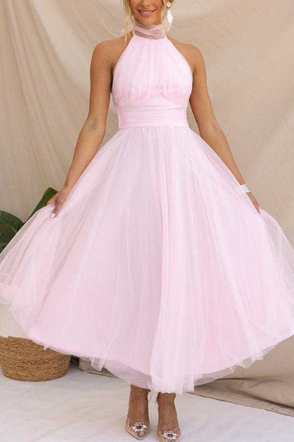 Elegant women's flowy halter maxi dress, designed for comfort & movement. Perfect wedding guest or prom gown.
