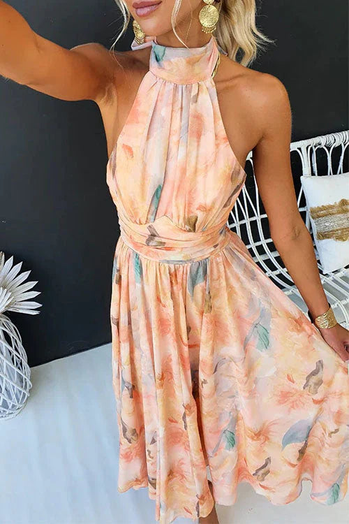 Women's elegant sleeveless halter maxi dress, a chic solid color formal gown perfect as a wedding guest outfit.