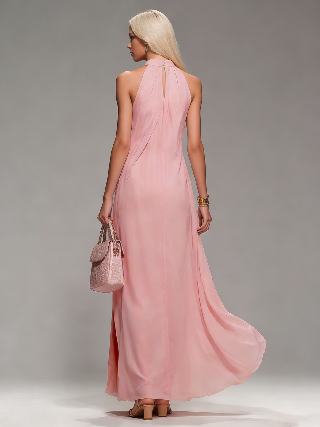 Comfortable women's flowy halter neck maxi dress with slit, ideal for summer fashion & vacation.