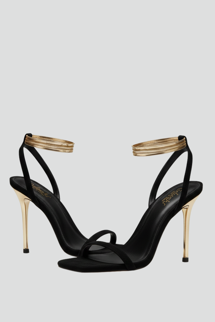 Elegant women's heeled sandals with delicate ankle strap, perfect for evening events & special occasions.