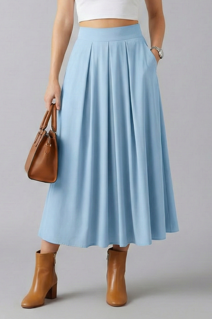 Women's elegant high waist pleated maxi skirt, long flowy design for a sophisticated look.