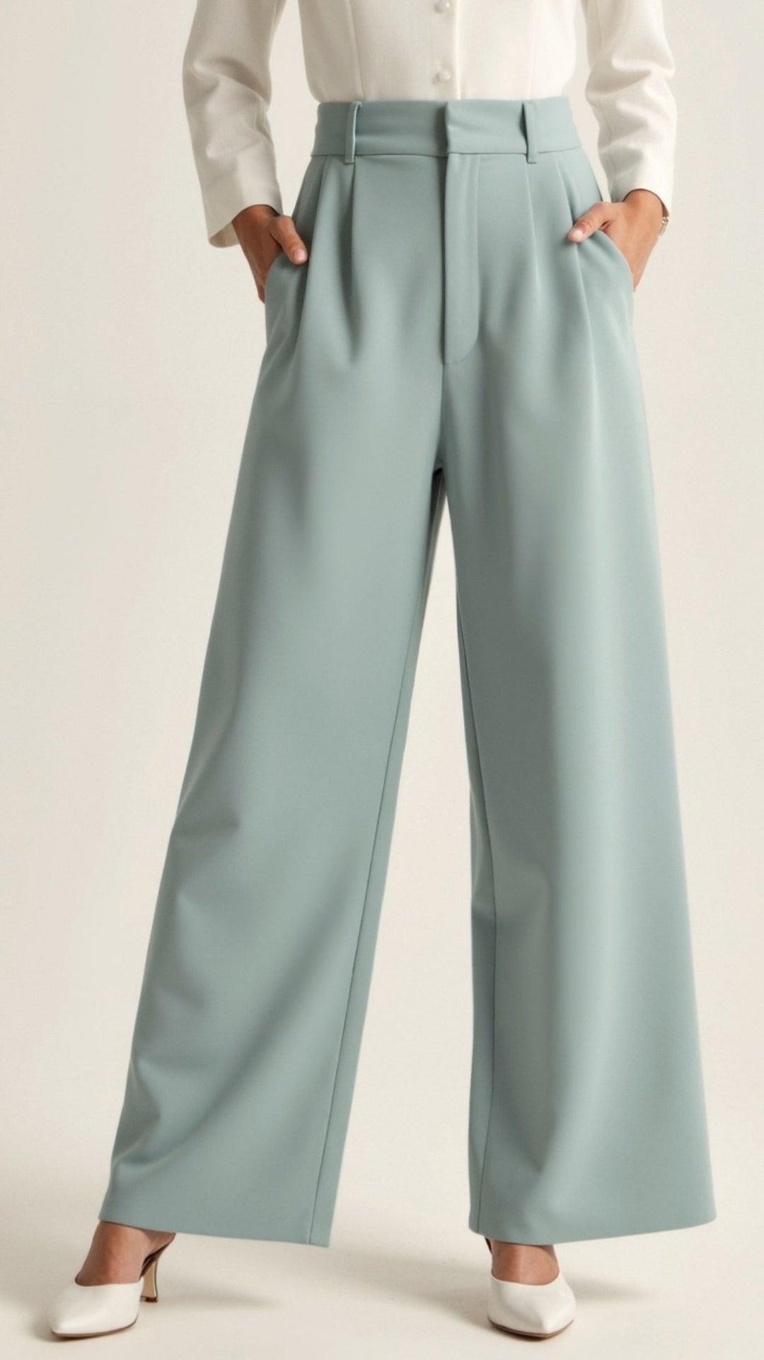 Close-up of the hem of women's wide-leg spring pants, illustrating the wide-leg cut and quality stitching.