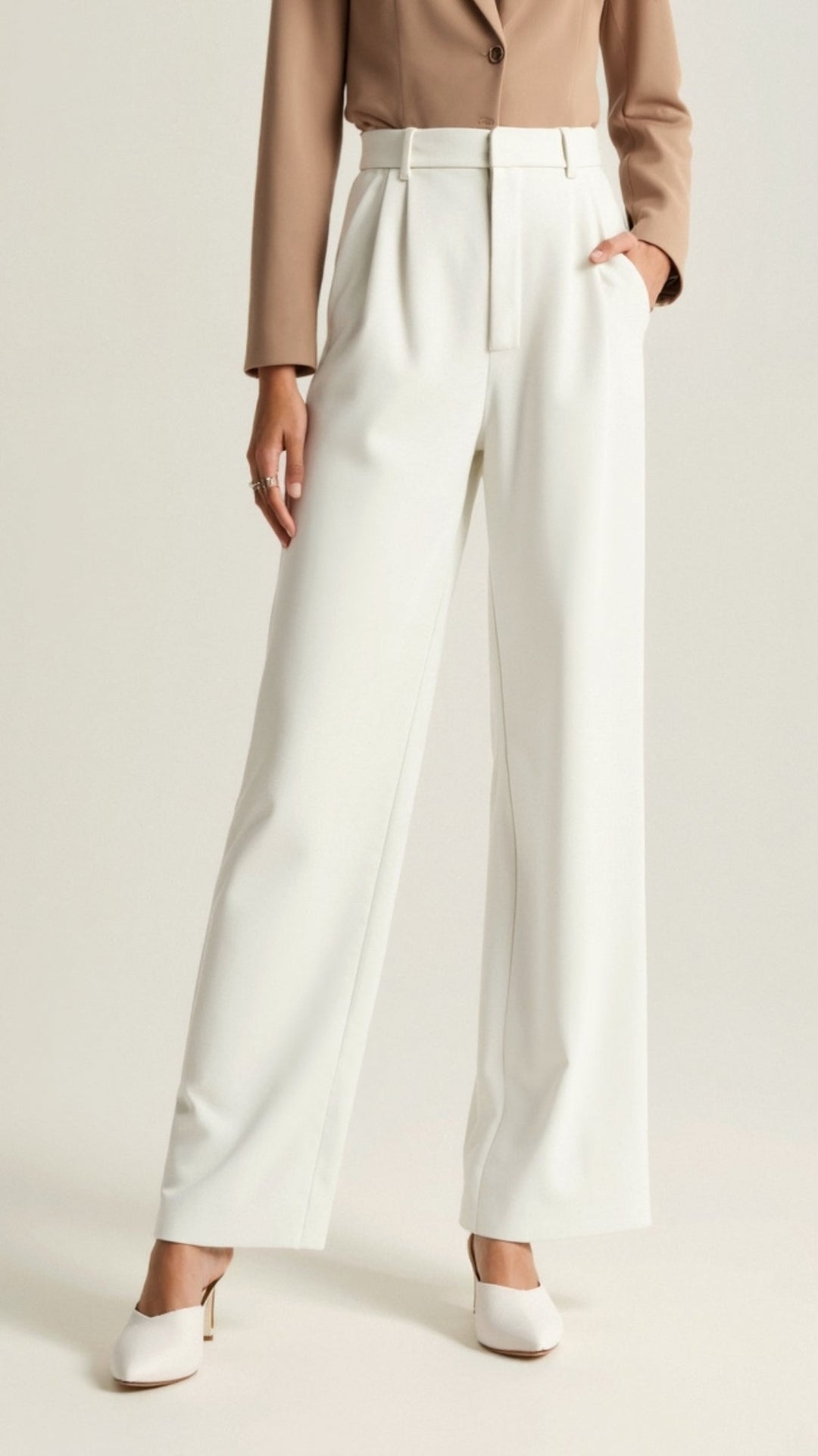 Close-up view of the pockets on high-waist wide-leg spring pants, functional and stylish design.