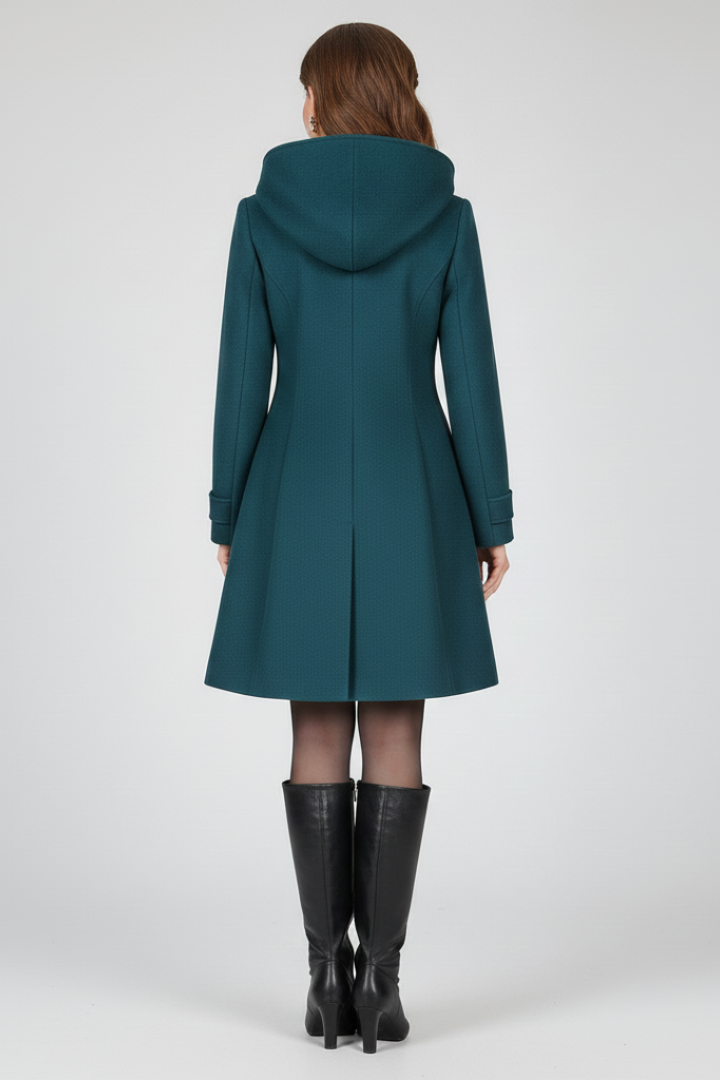 Stylish A-line women's coat with hood and double button closure. A structured and elegant design for fall & winter.