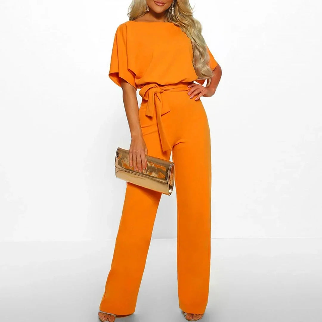 Spring/summer women's elegant jumpsuit, designed with a slim waist for a flattering silhouette.