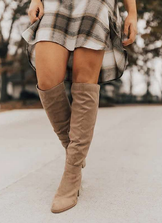 Elegant beige knee-high boots for women, perfect for fall fashion. Comfortable tall boots with a block heel.