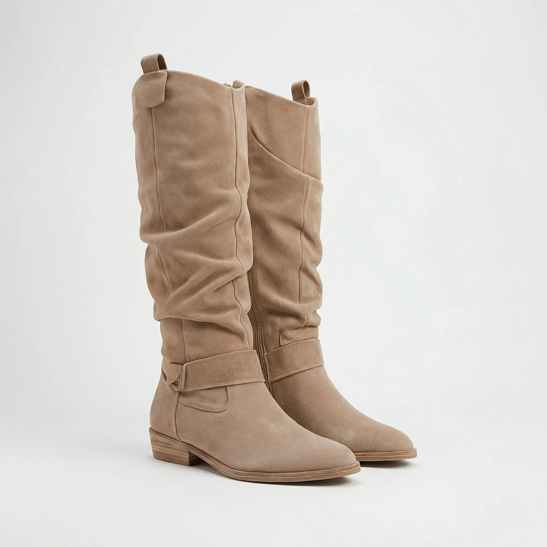Versatile women's knee-high boots with an elegant silhouette, ideal for casual outfits or chic fall/winter fashion.