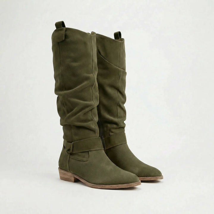 Comfortable black knee-high boots for women, featuring a practical zipper and supportive low heel for all-day wear.