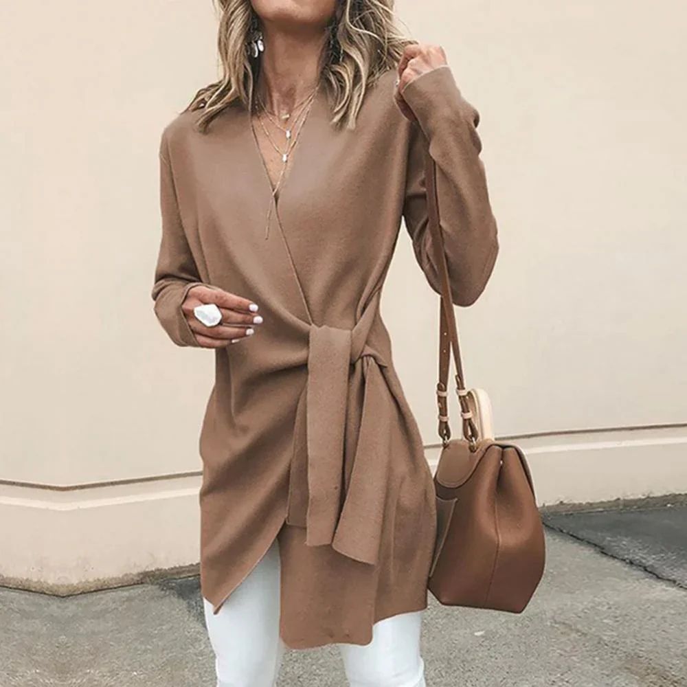 Stylish knit women's cardigan showcasing the elegant bow belt detail, perfect for winter outfits.