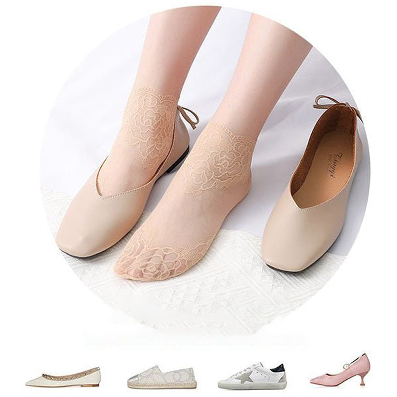 Close-up of the delicate mesh and lace pattern on a women's ankle sock, fashion accessory.