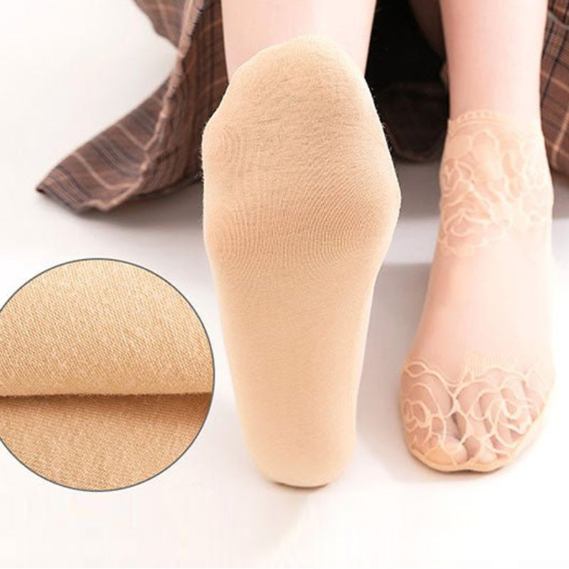 Stack of folded elegant women's lace and mesh ankle socks in various pastel shades.