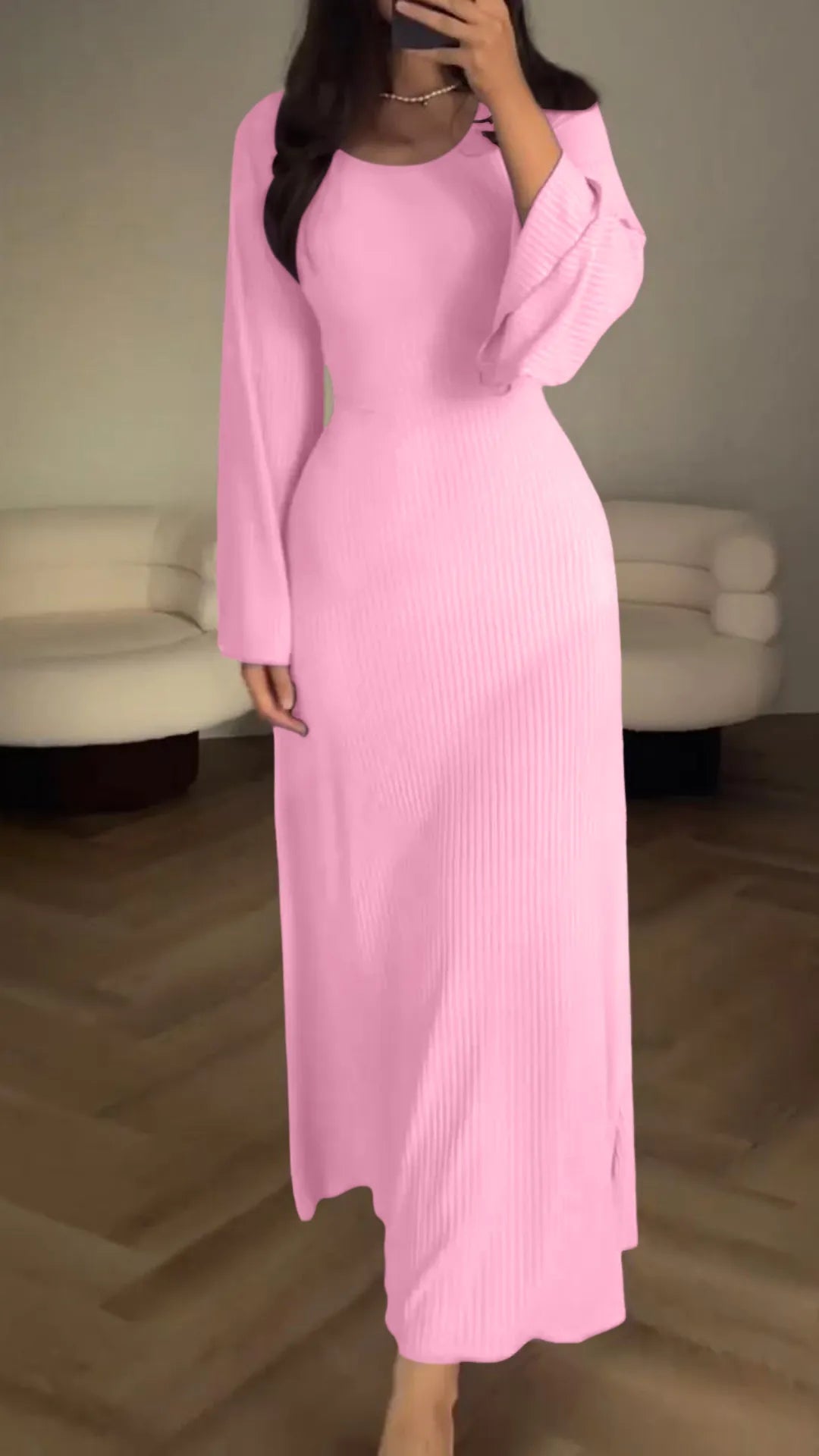 Flattering bodycon maxi dress for women, featuring a stylish lace-up front and long sleeves, evening wear.