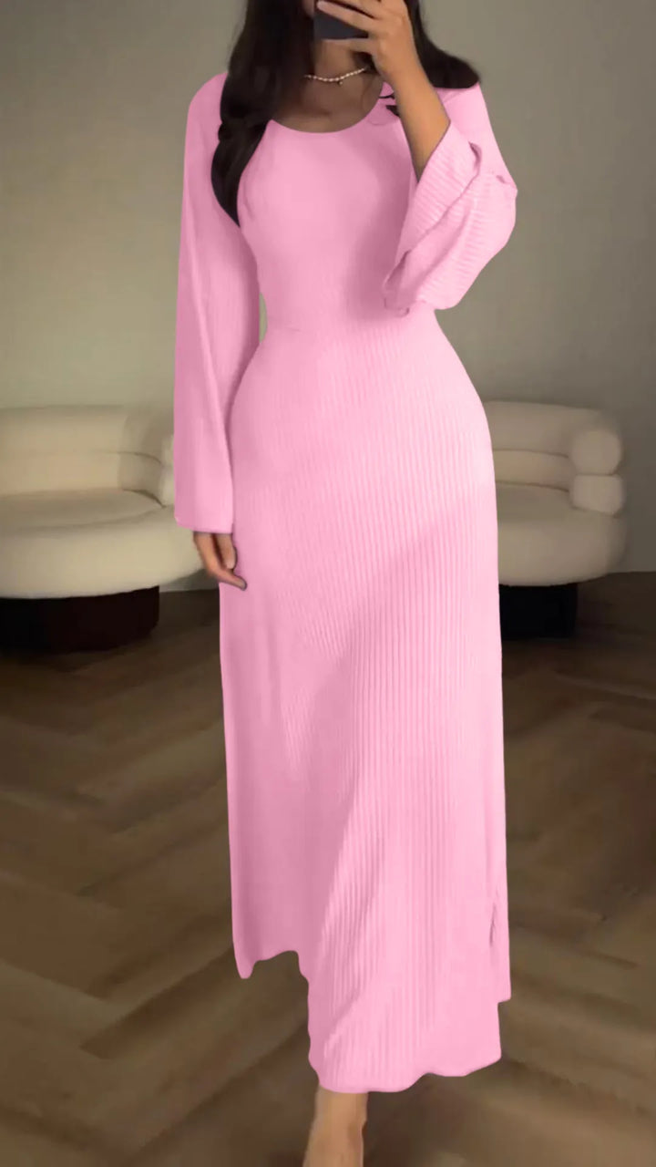 Flattering bodycon maxi dress for women, featuring a stylish lace-up front and long sleeves, evening wear.