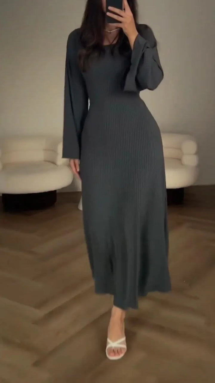 Long sleeve women's bodycon maxi dress with a flattering lace-up detail, elegant and formal evening wear.