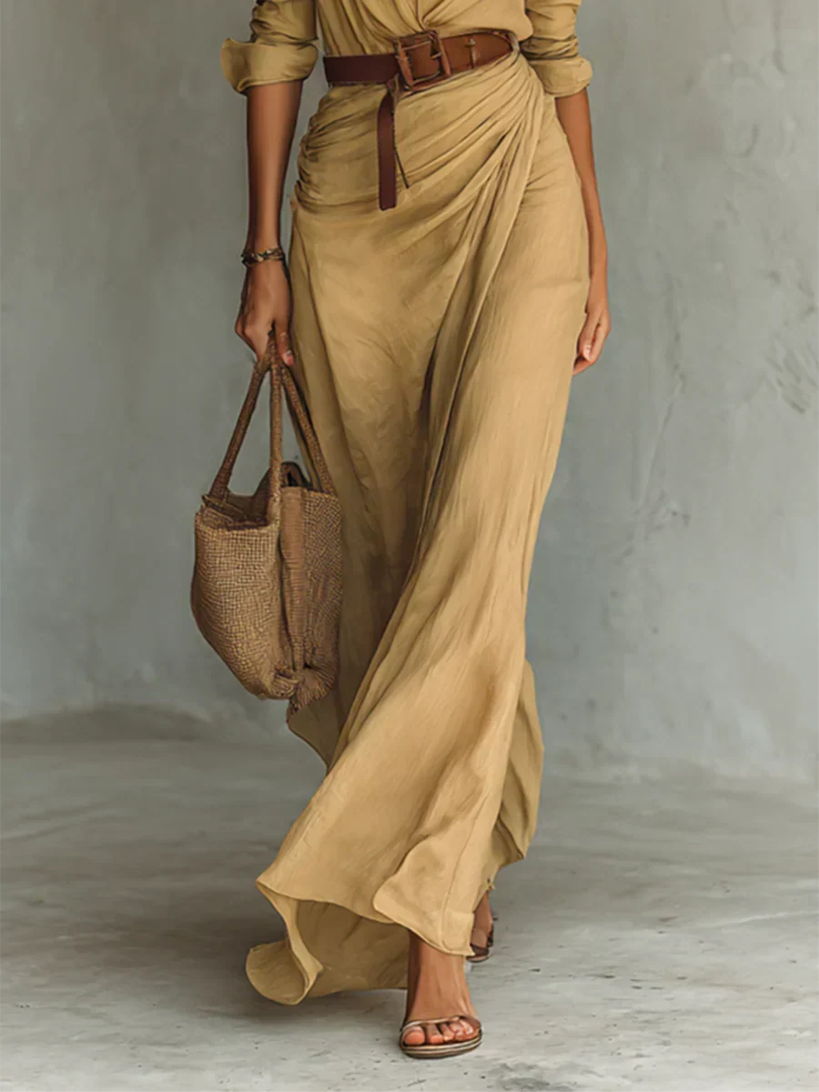 Flattering women's elegant belted maxi dress with lapel & long sleeves, creating a sophisticated silhouette.