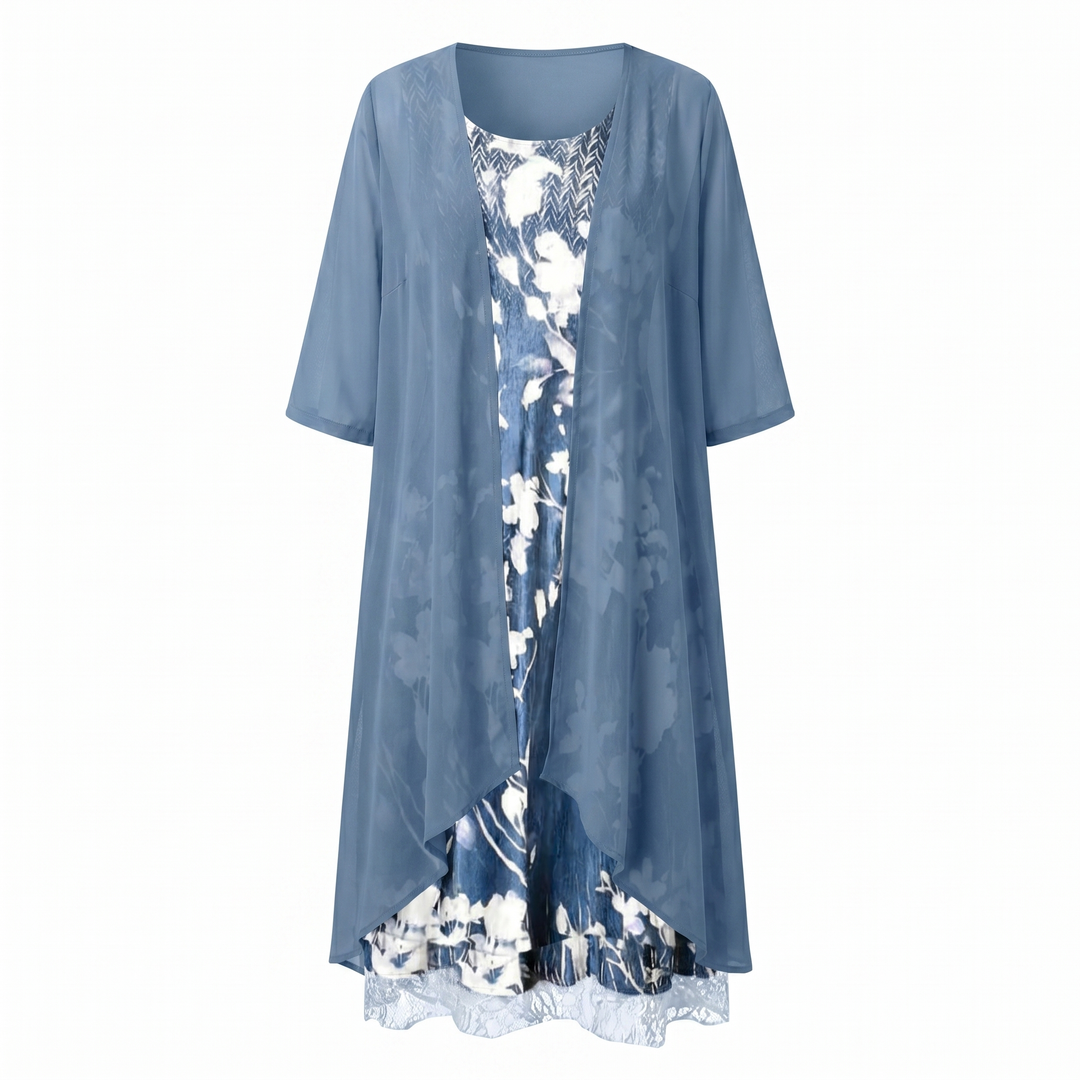 Women's floral print midi dress set. Features an elegant layered duster and comfortable flowy design.