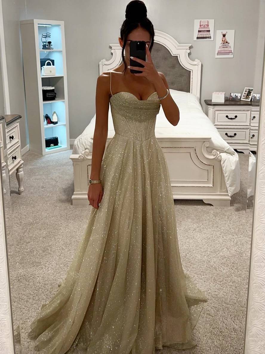 Stunning light pink long sleeve maxi dress for women, elegant design with a sophisticated open back.