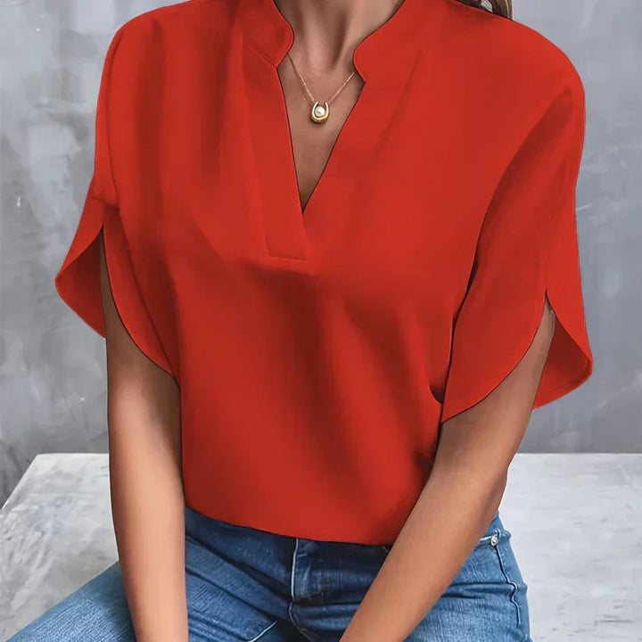 Stylish women's blouse, great for office wear or elegant casual outfits. Lightweight & easy care.