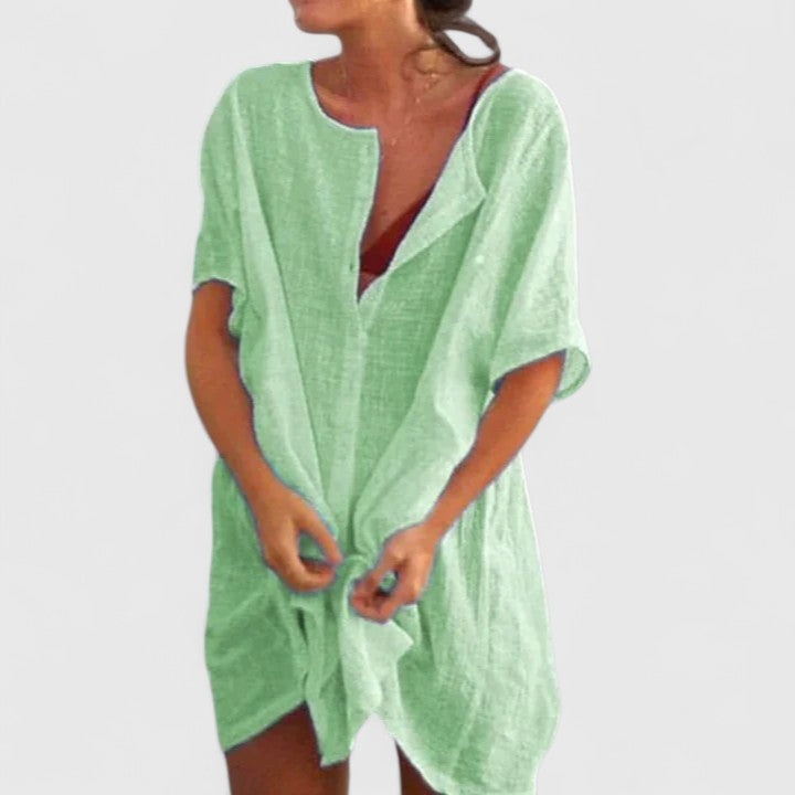 Blue lightweight women's tunic dress, a versatile summer style for casual and elegant looks.