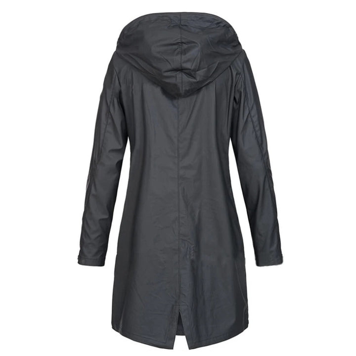 Trendy women's long autumn coat, a warm and elegant fall outerwear with a distinctive high collar and button tab.