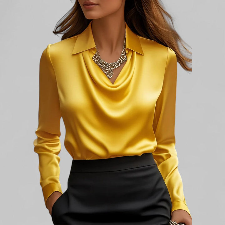 Fashionable women's blouse with an elegant draped neck & long sleeves, ideal for versatile styling & office wear.