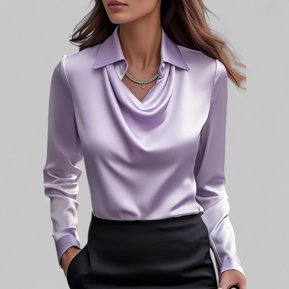 Modern ladies' draped neck blouse, a fashionable long sleeve top for a smart casual or office-ready ensemble.