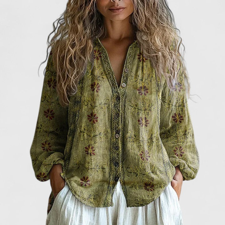 Stylish women's long sleeve printed blouse featuring a unique leaf pattern, suitable for both casual & office fashion.