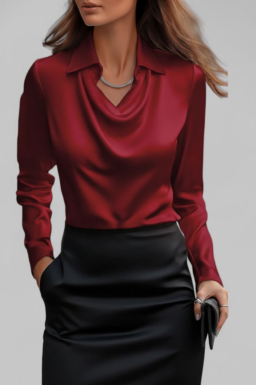 Fashionable women's apparel: an elegant draped long sleeve blouse for a sophisticated look.