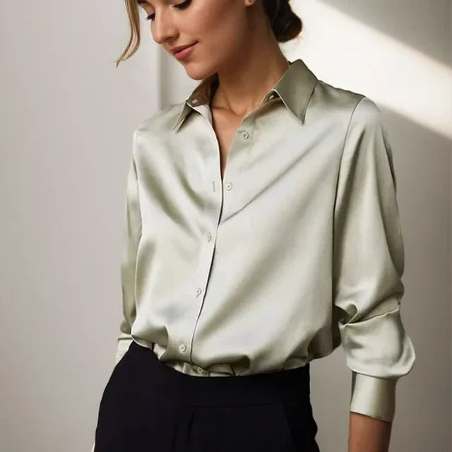 Elegant women's long sleeve button-down blouse, perfect for office wear or sophisticated casual chic outfits.