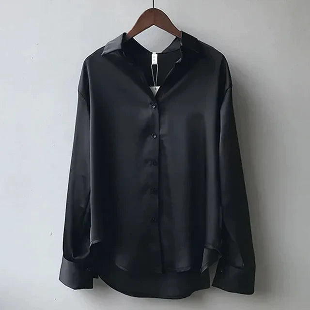 Sophisticated women's long sleeve button-down shirt, a versatile and elegant top for fashion-forward women.