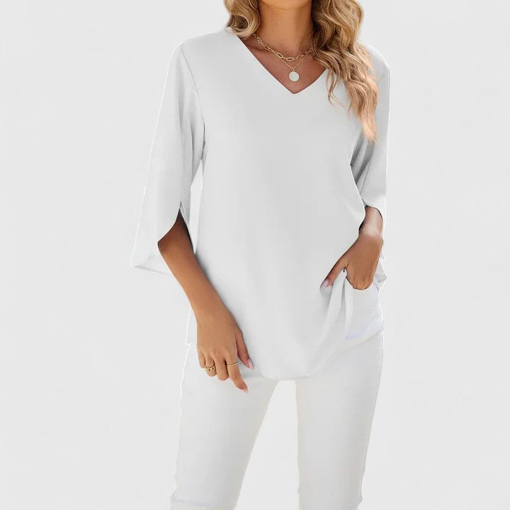 Ladies' long-sleeve elegant blouse. Chic versatile top suitable for workwear, casual, or party style.