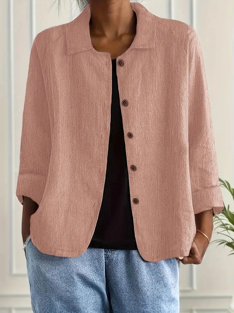 Sophisticated women's collared shirt. Long sleeve button-up blouse with open collar, a versatile stylish top.