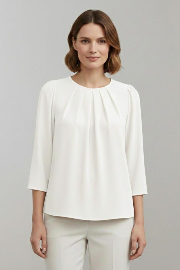 Pleated front long sleeve blouse for women. An elegant and versatile top, great for office or casual style.