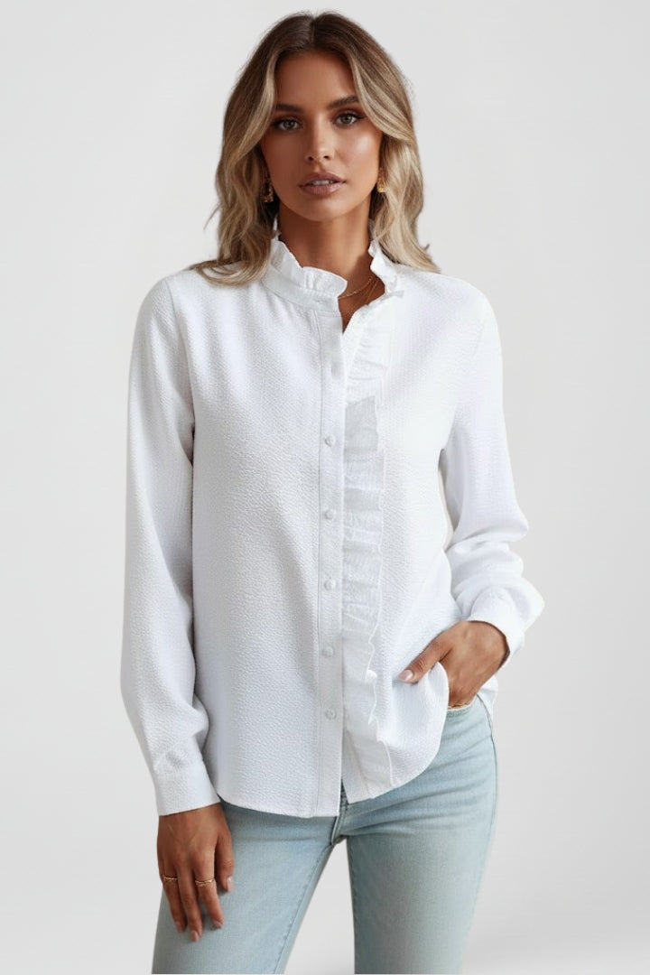 Stylish women's ruffle button-front blouse. Long sleeve top, ideal for casual chic and everyday wear.