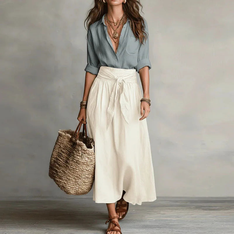 Elegant women's long sleeve skirt co-ord set, perfect for sophisticated office attire or a chic casual outing.