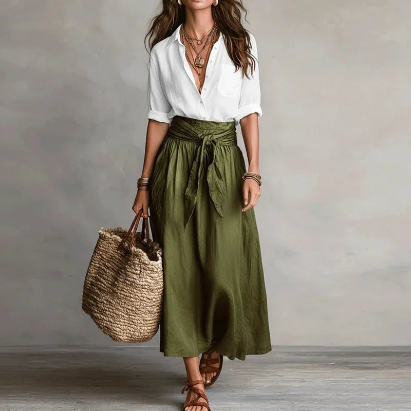 Stylish women's long sleeve co-ord set, an elegant skirt and top combo, ideal for versatile casual or office wear.