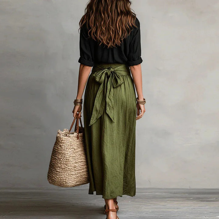 Fashionable women's long sleeve skirt and top co-ord set, showcasing modern elegance for office, events, or daily wear.