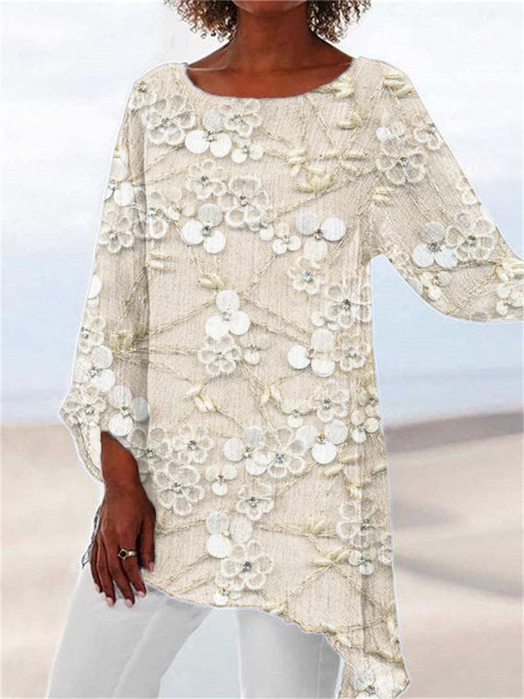 Elegant women's long sleeve tunic top with delicate floral embroidery and a stylish asymmetrical hem for casual wear.