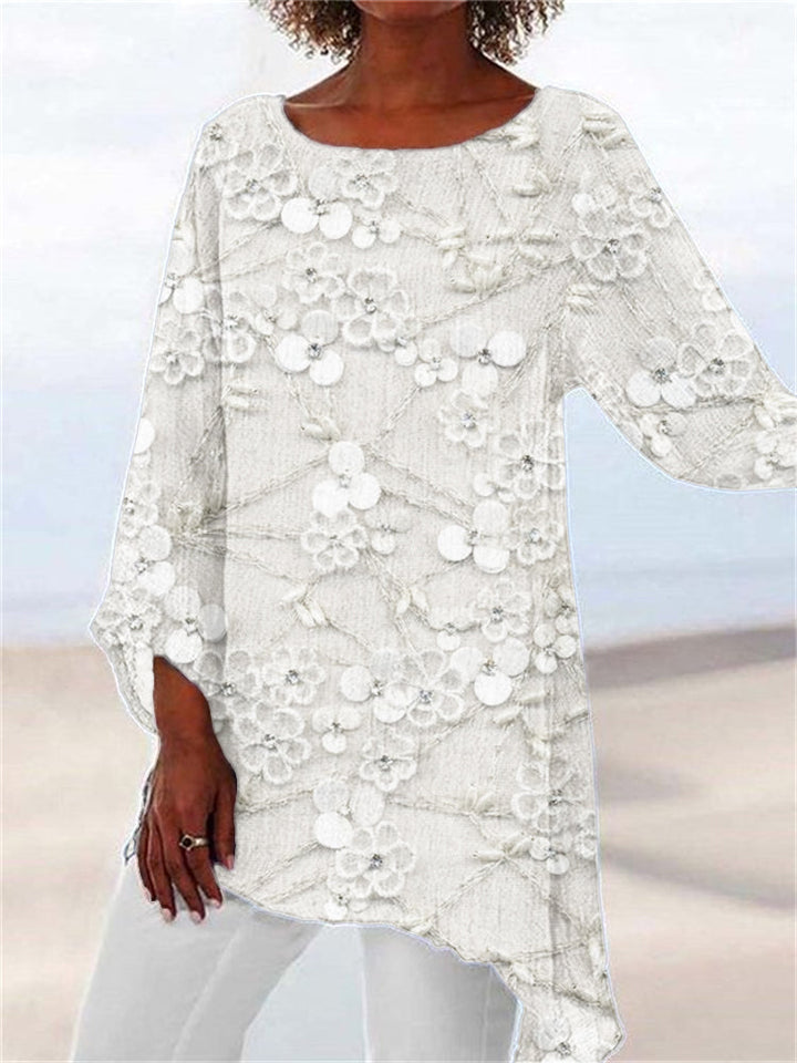 Chic women's floral embroidered tunic with an asymmetrical hem, perfect for elegant casual spring & autumn outfits.