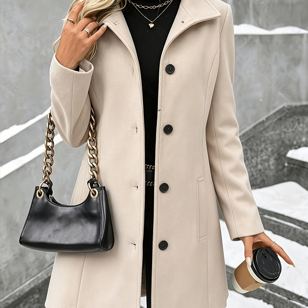 Women's elegant longline coat with a notch collar and single breasted closure, ideal for professional wear.