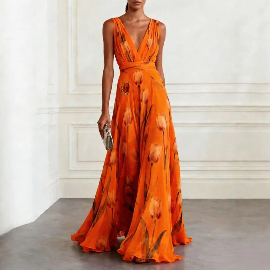 Full-length women's floral maxi dress in a tulip print, an elegant choice for a wedding guest or evening event.
