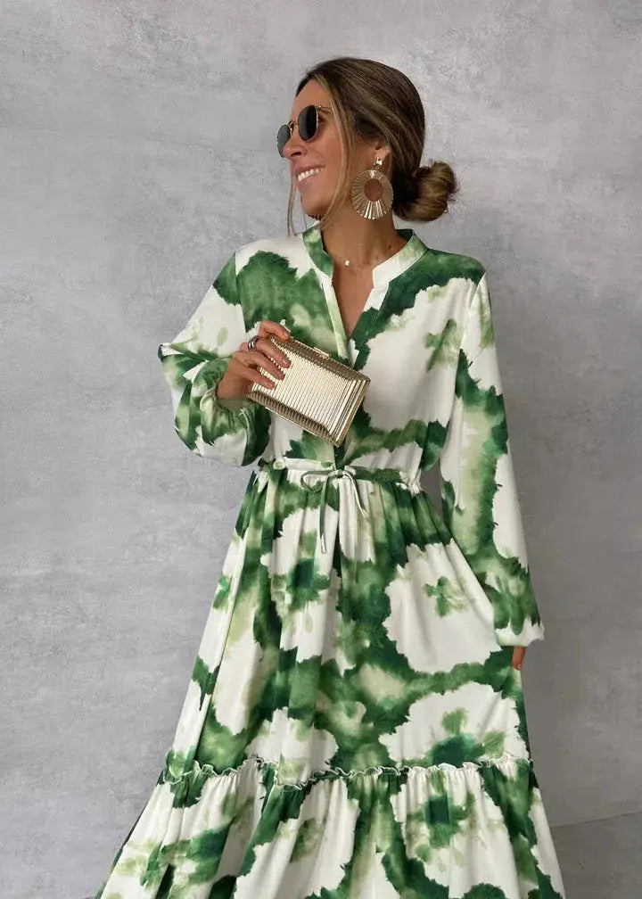 Elegant women's maxi dress with long puff sleeves, V-neck & tie waist, perfect for formal events & wedding guests.