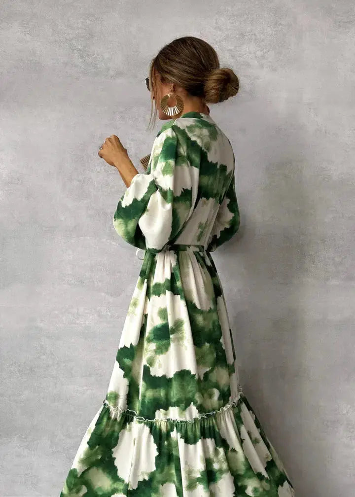 Loose-fit elegant women's maxi dress with long puff sleeves, perfect for formal evening wear & special occasions.