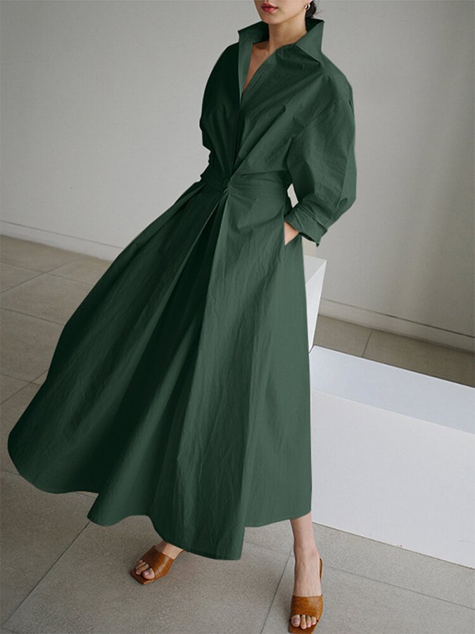 Women's elegant puff sleeve twist waist maxi dress. V-neck, A-line, long, sophisticated design.