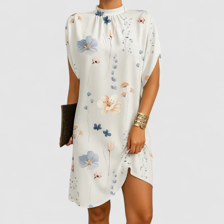 Stylish women's elegant maxi dress with shoulder cutouts, ideal for party wear or a chic evening event.