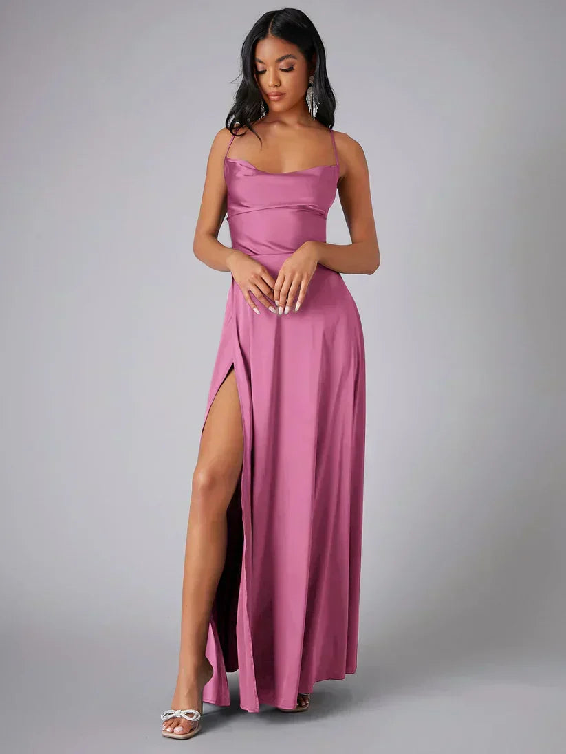 Sophisticated women's evening dress. Full-length gown with a sexy high slit & elegant open-back design.